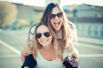 two beautiful young women having fun