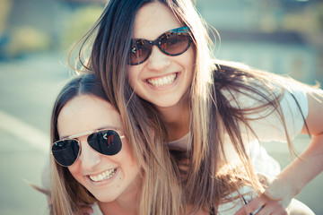 two beautiful young women having fun