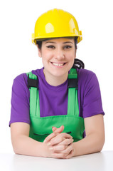 Young woman in green coveralls