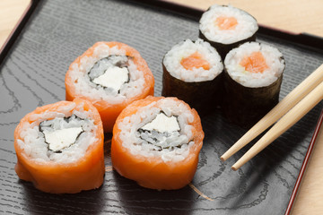 Sushi with chopsticks