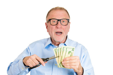 Cut your expense concept. Senior man planning on budget