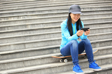 woman skateboarder on street 