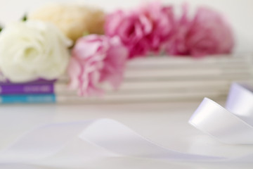 Obraz na płótnie Canvas Blur abstract floral background with ribbon
