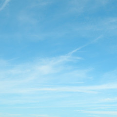 fluffy clouds in the blue sky