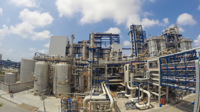 Time lapse of Chemical Industrial plant with blue sky