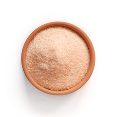 Special pink salt from the Himalayas, in a small bowl isolated