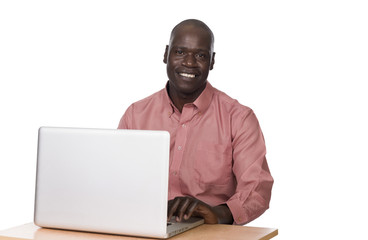 young black man with laptop