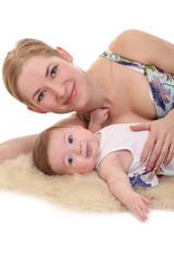 Obraz na płótnie Canvas happy mother holding her baby