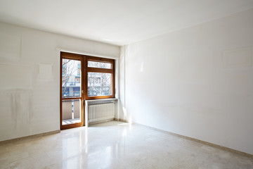 Empty room with marble floor in normal apartment