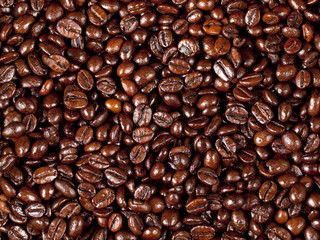 Background of freshly dark roasted coffee beans