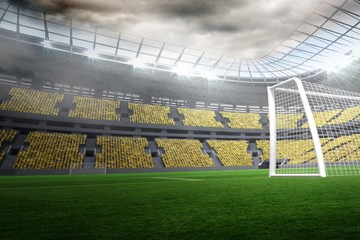 Large football stadium with lights