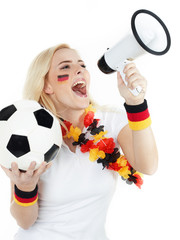 Girly soccer fan shouting loud through megaphone