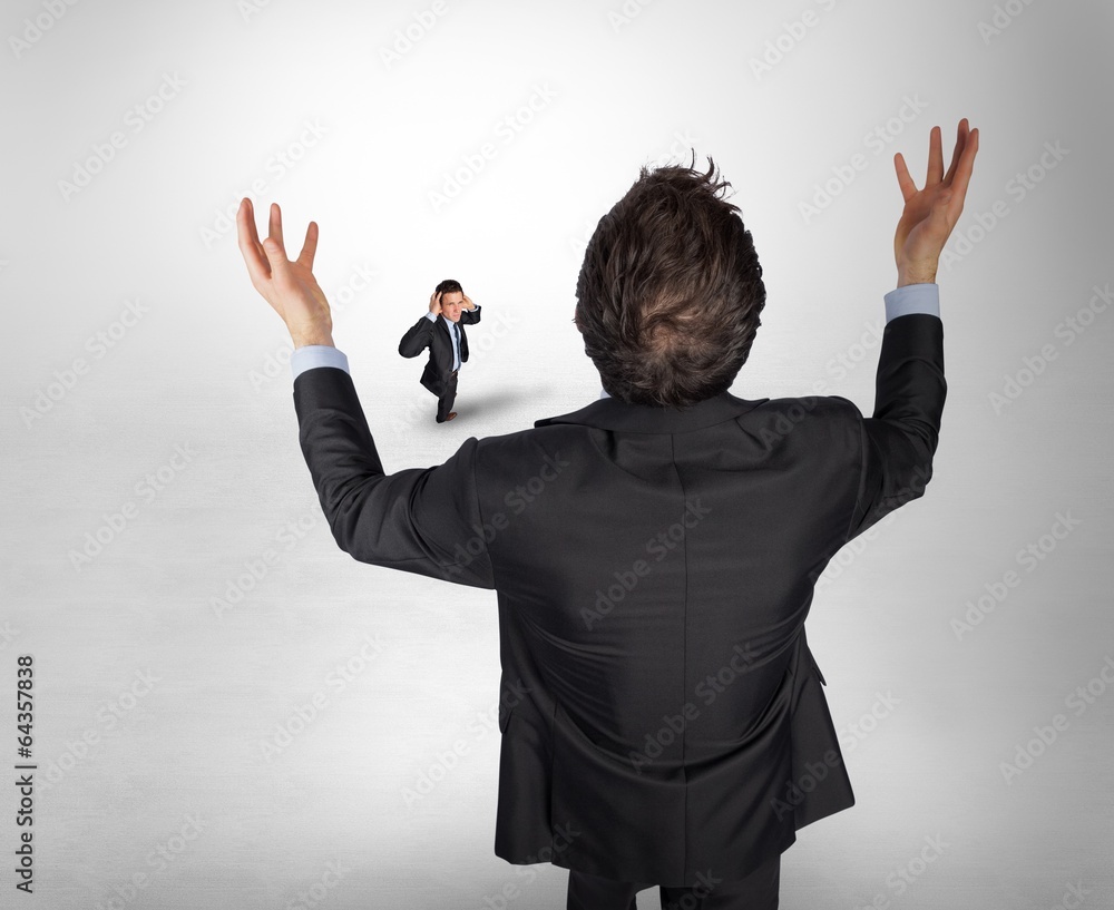 Poster composite image of gesturing businessman with tiny businessman