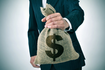 businessman with a burlap money bag
