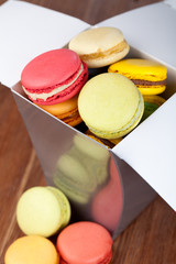 Macaroons on a wooden table