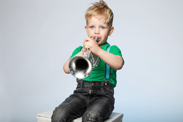 Child plays a musical instrument