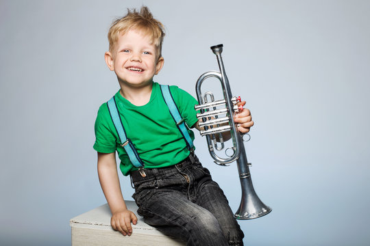 Happy child with trumpet