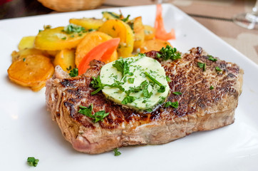 steak beef meat with tomato and french fries