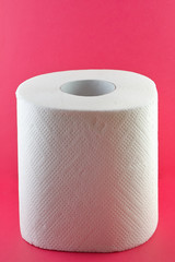 Toilet paper on pink