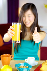 Thumb up for orange juice