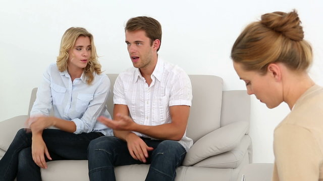 Couple talking with their therapist