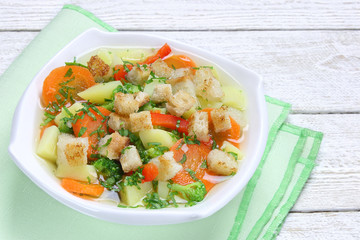 Diet vegetable soup with croutons