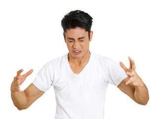 Fototapeta premium Angry frustrated young man isolated on white background 