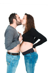 Man posing with his pregnant wife