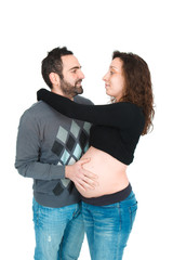 Man posing with his pregnant wife