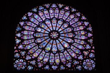 Stained glass window inside Notre Dame de Paris