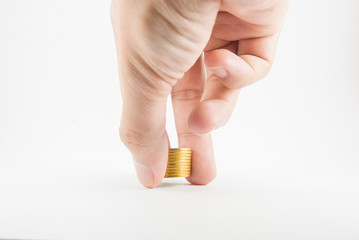 Hand holding gold coins