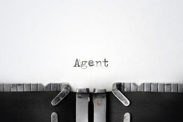 "Agent" written on an old typewriter