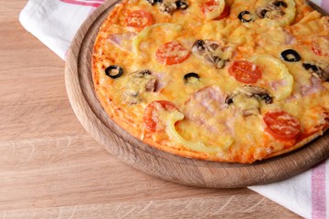 Tasty pizza on table close-up