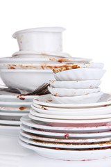 Dirty dishes isolated on white