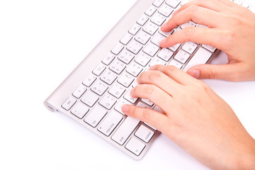 Fototapeta na wymiar women Hands typing on the remote wireless computer keyboard