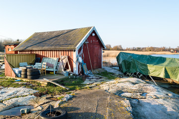 Covered boat and boathouse