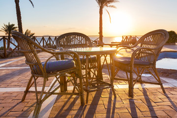 Chair near swimming pool