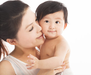 Happy  mother holding smiling child baby