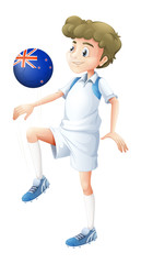 Fototapeta premium A boy using the ball designed with the flag of New Zealand