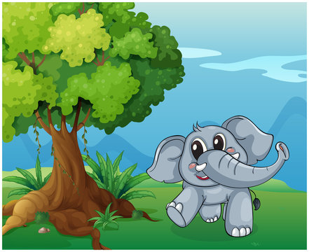 An elephant beside the tree