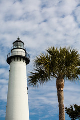 White Brick Lighthouse and Palm Tree