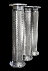 Metal hoses isolated on black.