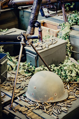 Old military helmet and bullets