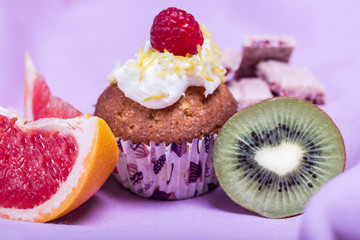 cupcakes with raspberries and fruity chocolate
