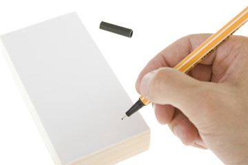 Leave a note / Hand with pen writing a message on blank paper.