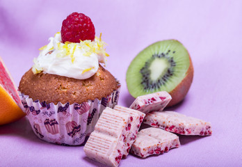 cupcakes with raspberries and fruity chocolate