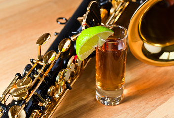saxophone and tequila with lime