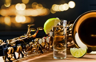Fotobehang saxophone and tequila with lime © Igor Normann
