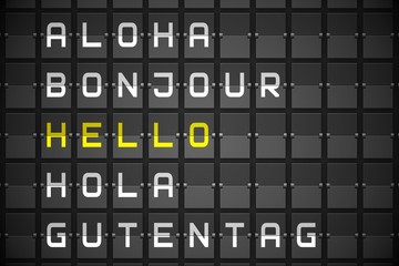 Hello in languages on black mechanical board