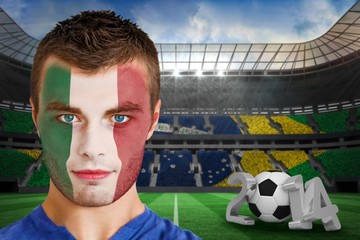 Serious young ivory coast fan with face paint